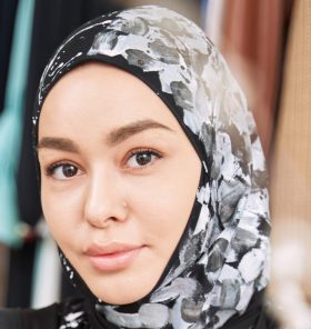 smiling young woman making sketches of islamic fas 2022 03 25 18 55 43 utc cropped.jpg